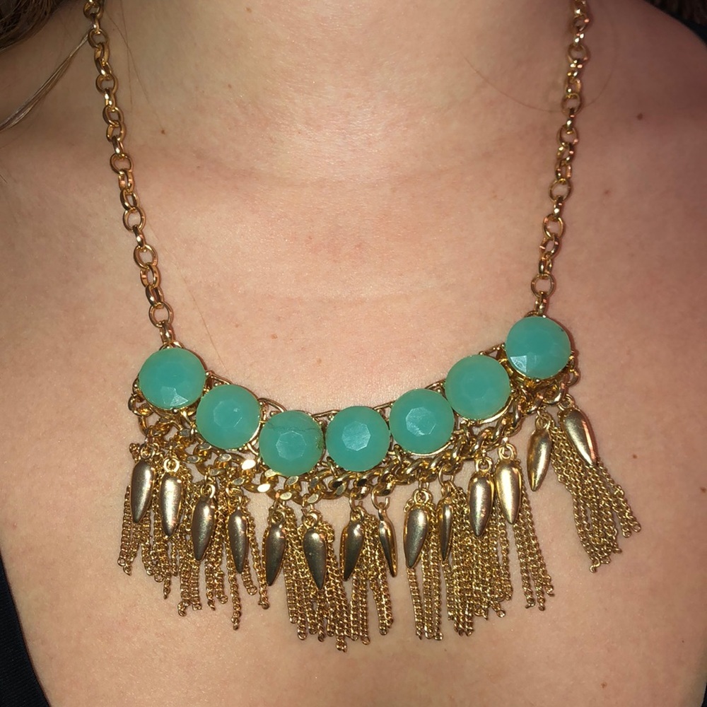 Blue necklace with gold tassels